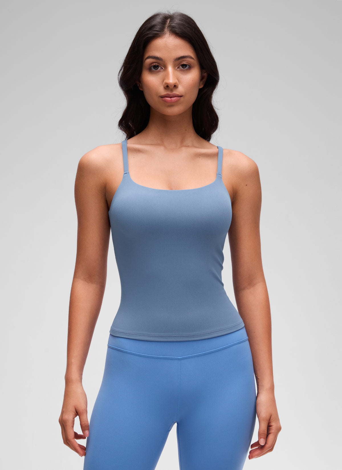 CRZ YOGA Women's Yoga Softretch U Back Waist Length Built in Bra Tank Washed Denim @model_info:Maysa