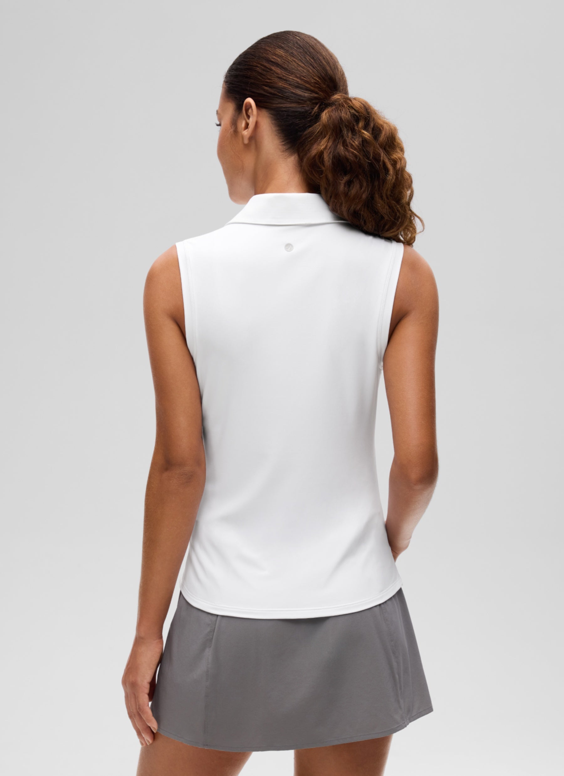 CRZ YOGA Women's Golf Tennis Hip Length Slim Fit Sleeveless Polo White @model_info:J