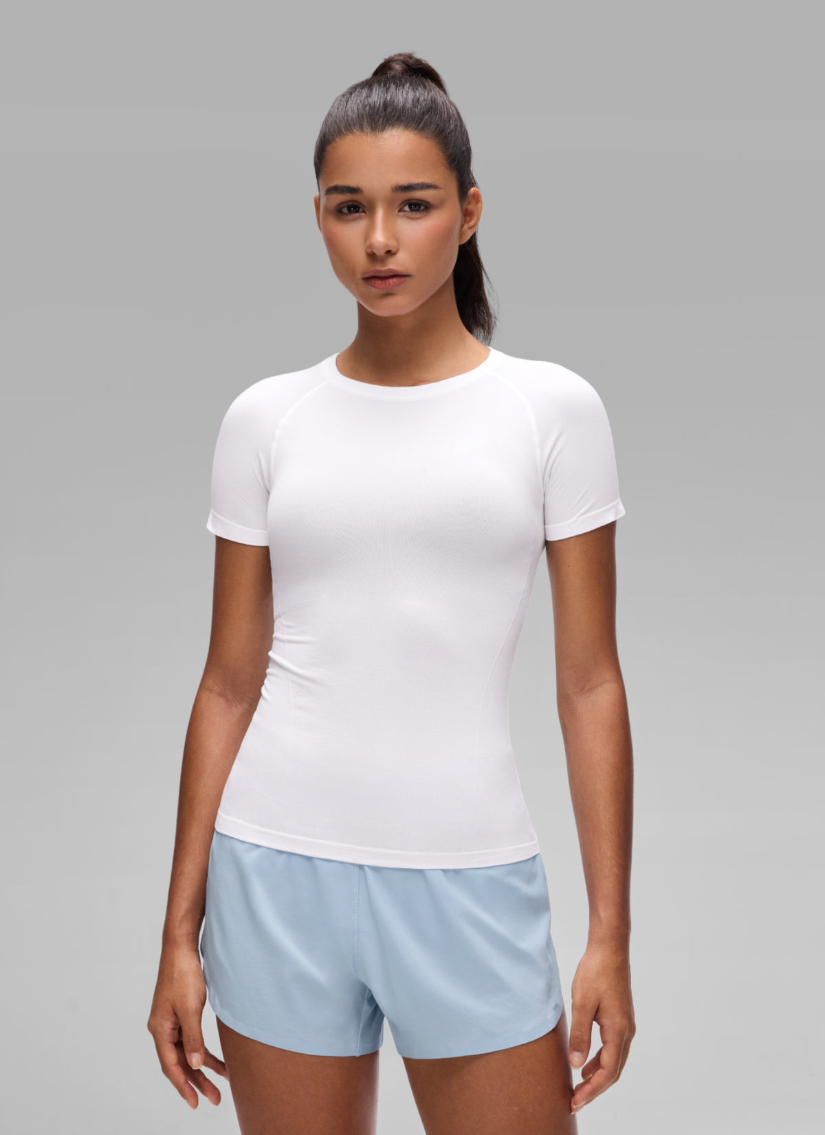 CRZ YOGA Women's Workout Seamless Crewneck Fitted Hip Short Sleeves White @model_info:A