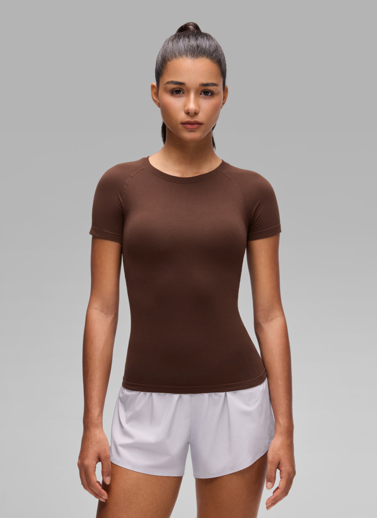 CRZ YOGA Women's Workout Seamless Crewneck Fitted Hip Short Sleeves Lava Brown @model_info:A