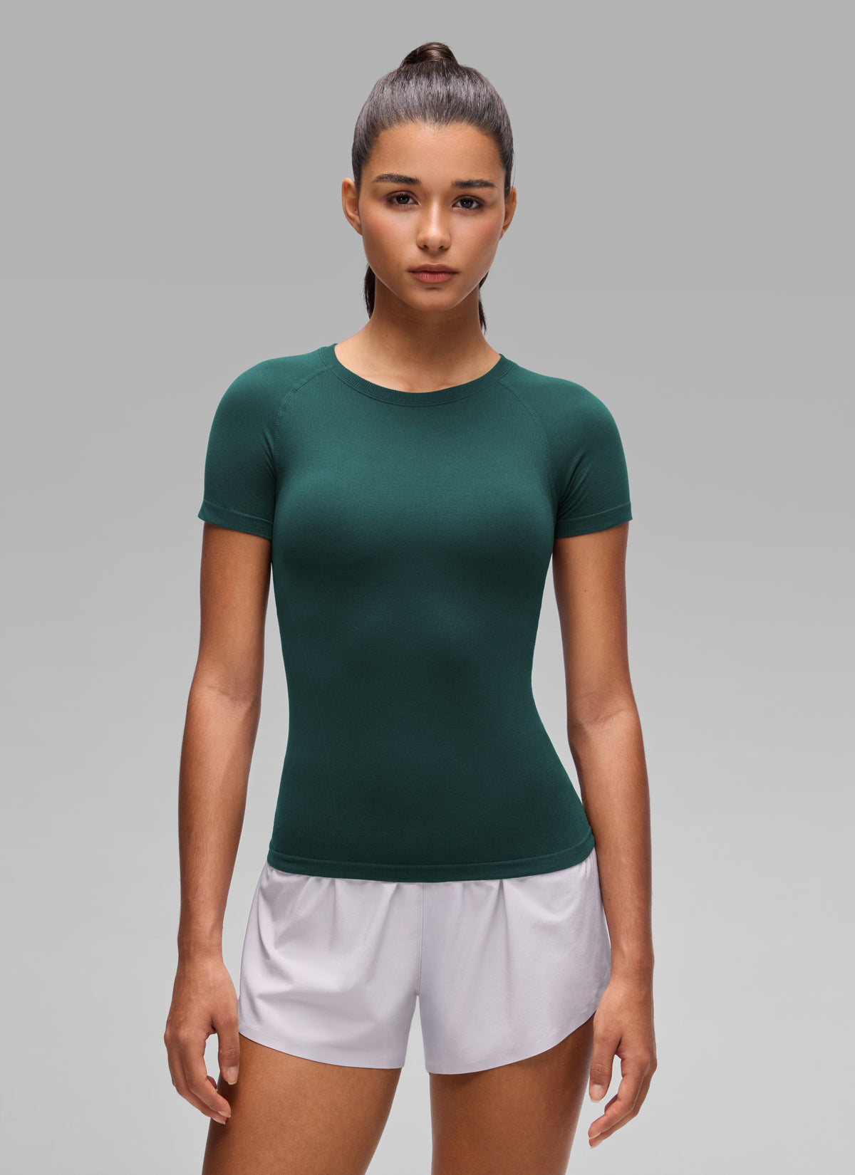 CRZ YOGA Women's Workout Seamless Crewneck Fitted Hip Short Sleeves Forest Green @model_info:A
