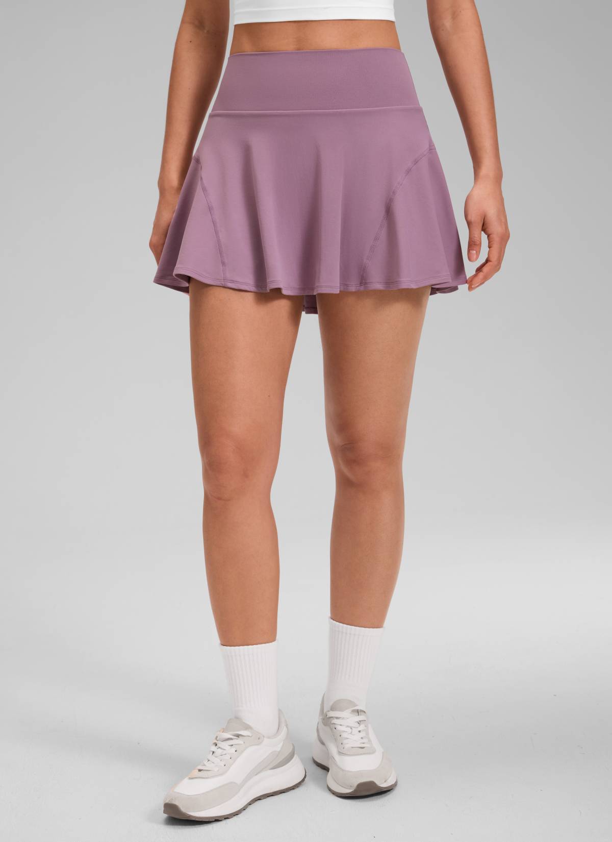 CRZ YOGA Women's Softretch Tennis High Rise Pocket Flowy Pleated Skirt Light Lavender @model_info:Larissa