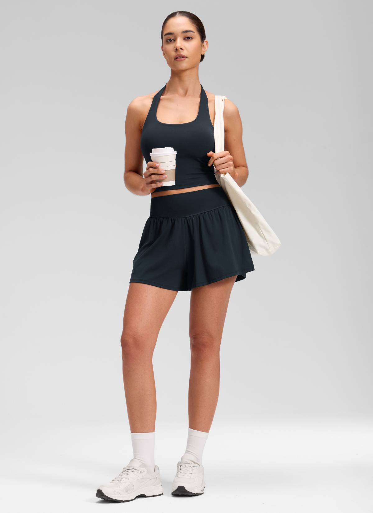 CRZ YOGA Women's Softretch Yoga High Rise Pocket Flowy 2 in 1 Shorts True Navy @model_info:Marcela
