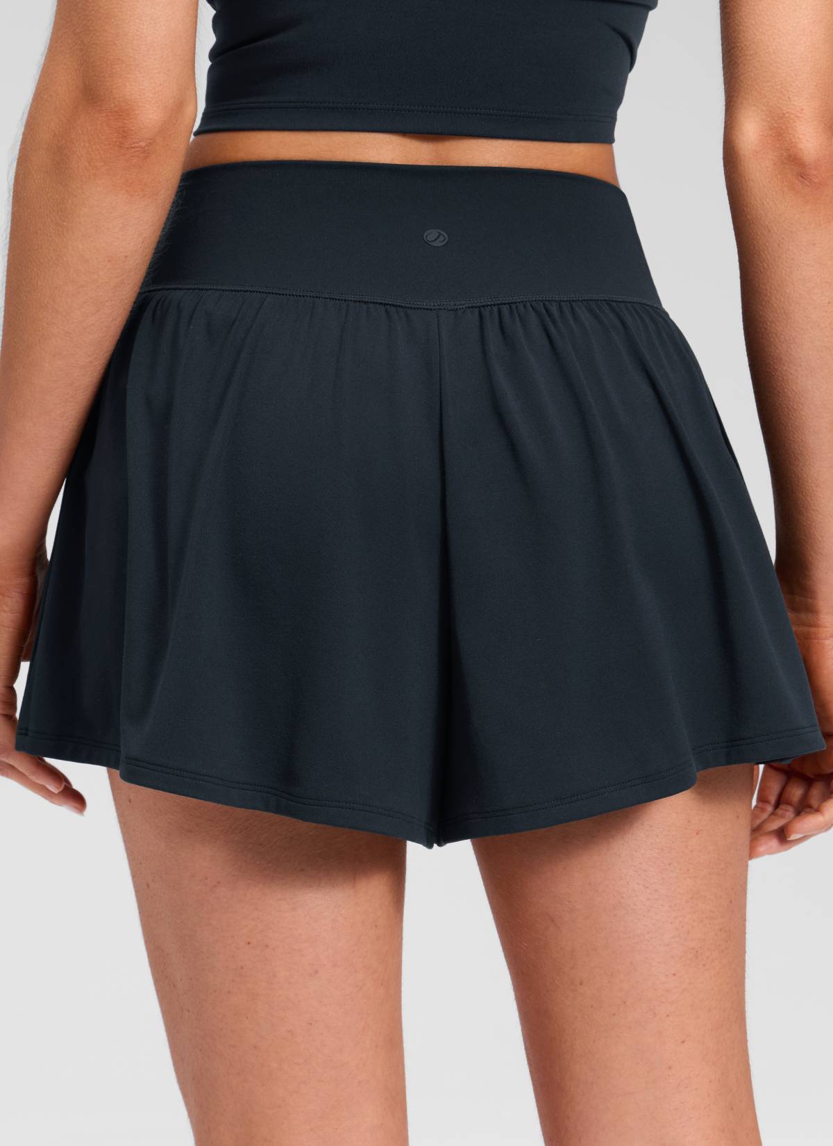 CRZ YOGA Women's Softretch Yoga High Rise Pocket Flowy 2 in 1 Shorts True Navy @model_info:Marcela